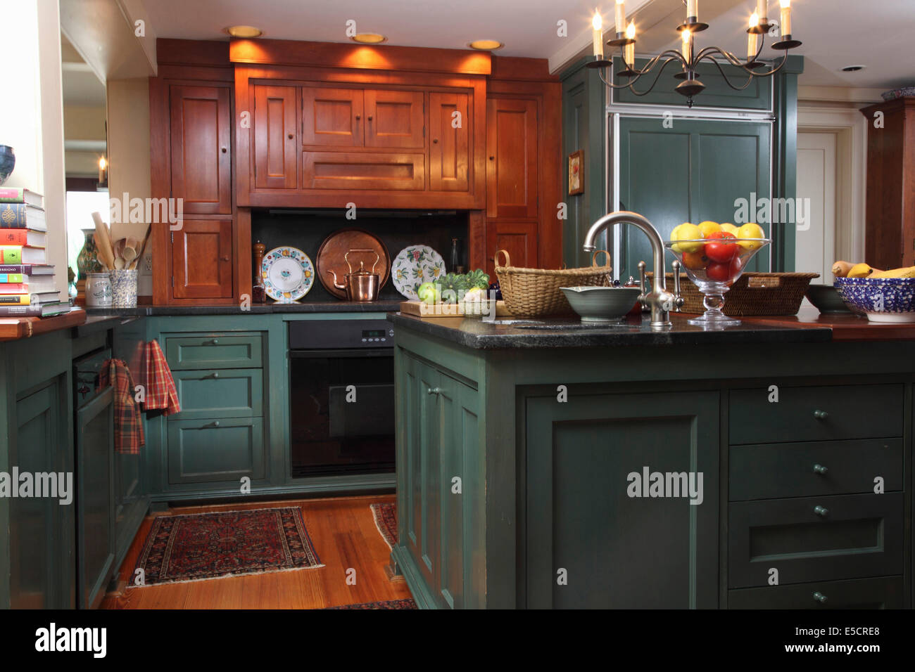 Kitchen with custom wood cabinets and verdigris green paint in private  residence, USA Stock Photo - Alamy, image size:1300x956