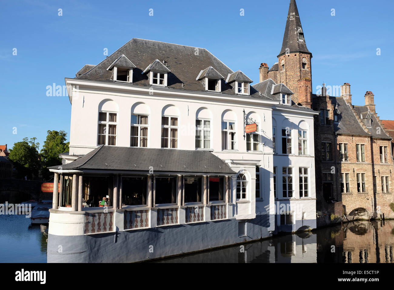Hotel-Restaurant Duc de Bourgogne from the Rozenhoedkaai in the canal of Bruges old town, Belgium Stock Photo