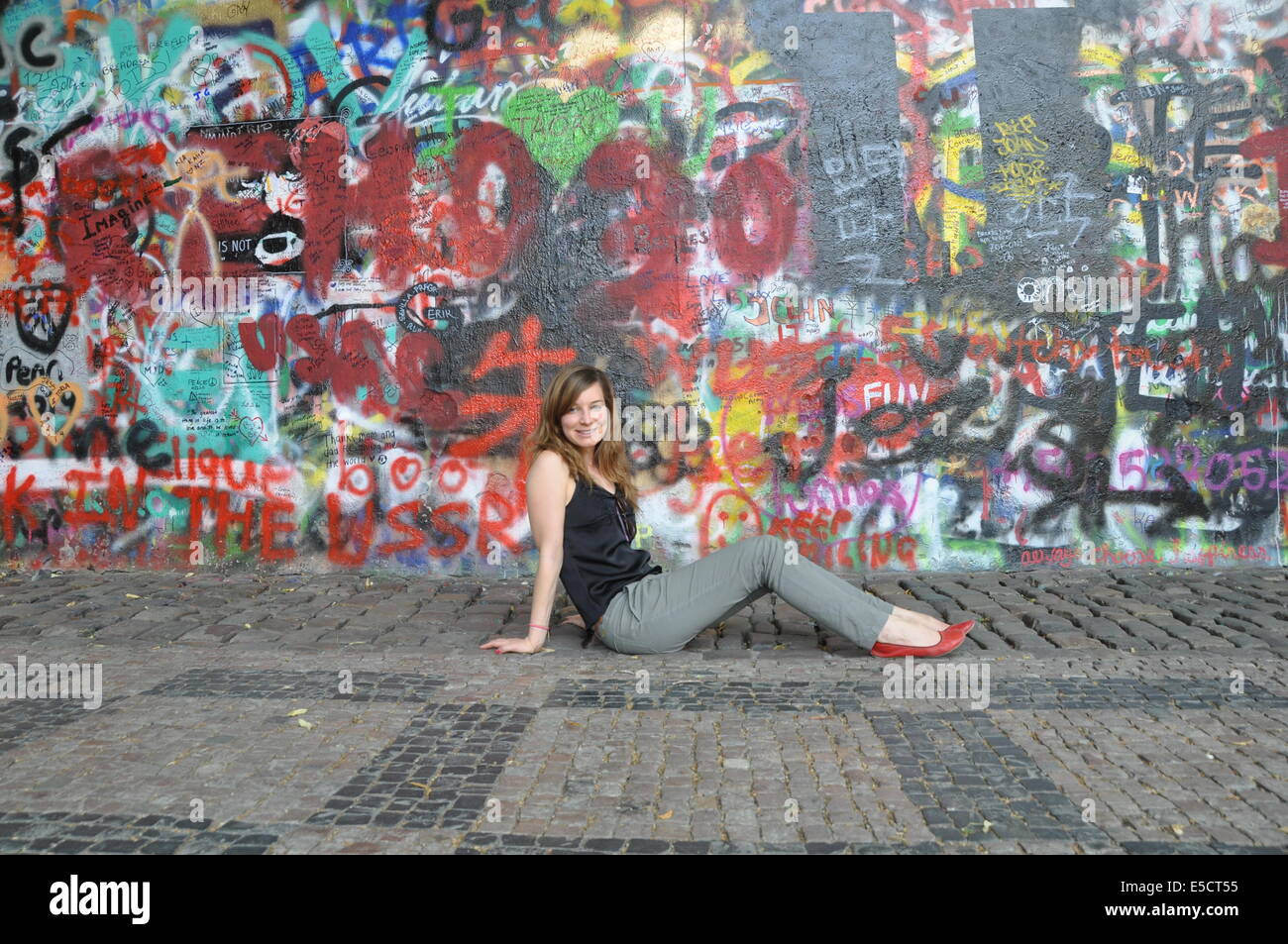 Colorful graffiti at the famous John Lennon wall in Prague, Czech Republic. Model Release