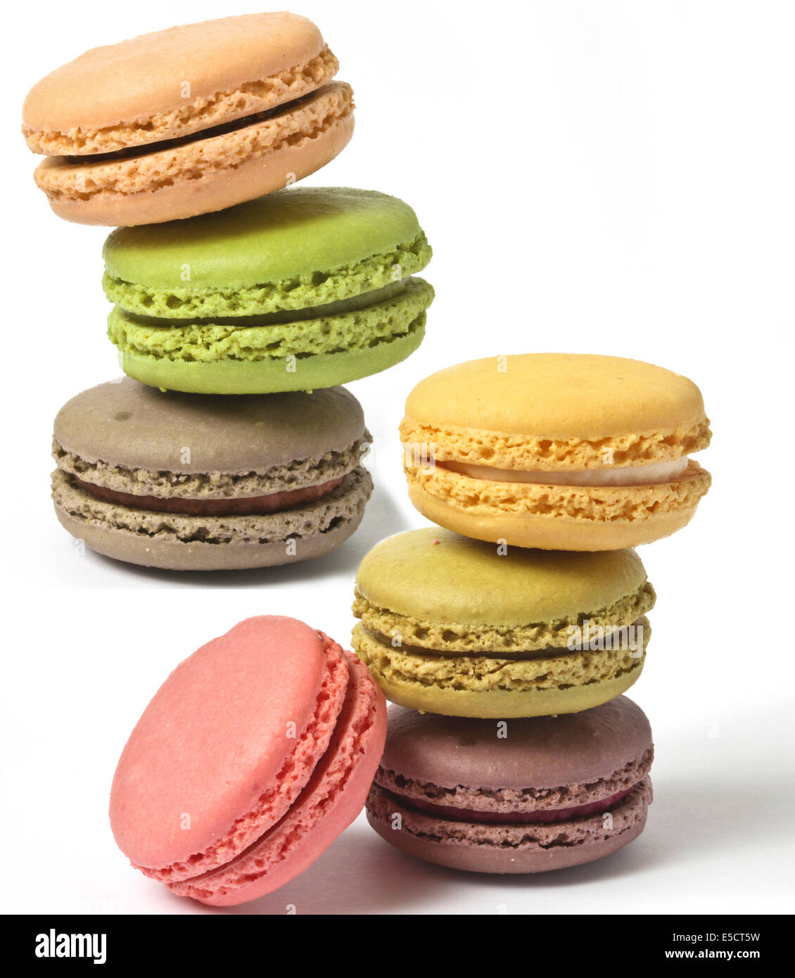 Stack of multicolour macaroon biscuits isolated on white. Stock Photo