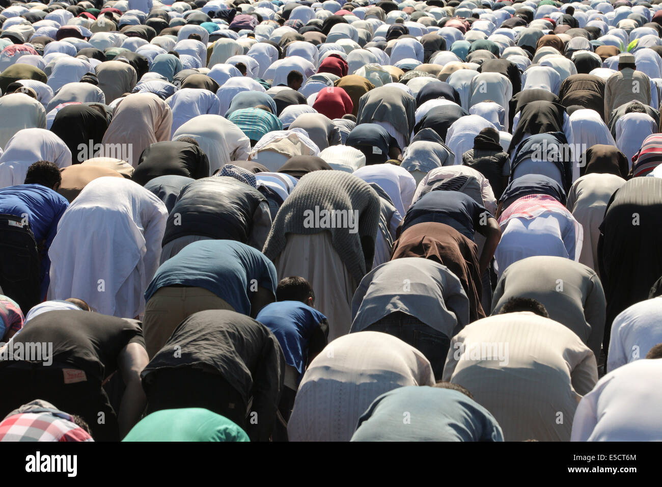Muslims praying at an outdoor Eid celebration. Small Heath Park, Birmingham UK Stock Photo