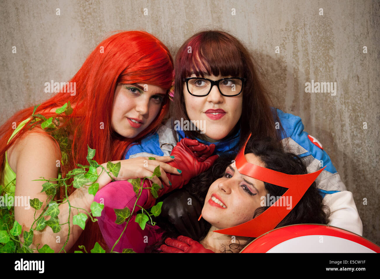 Superheroines cosplay girls at Barcelona International Comic Fair on May 17, 2014 in Barcelona, Catalonia, Spain. Stock Photo