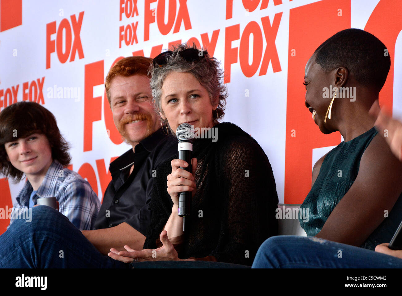 Chandler Riggs, Michael Cudlitz, Melissa McBride and Danai Gurira attend the FOX Press Breakfast press conference of the series 'The Walking Dead' on July 25, 2014 at the roof lounge of the Andaz Hotel in San Diego during the San Diego Comic-Con International. Stock Photo