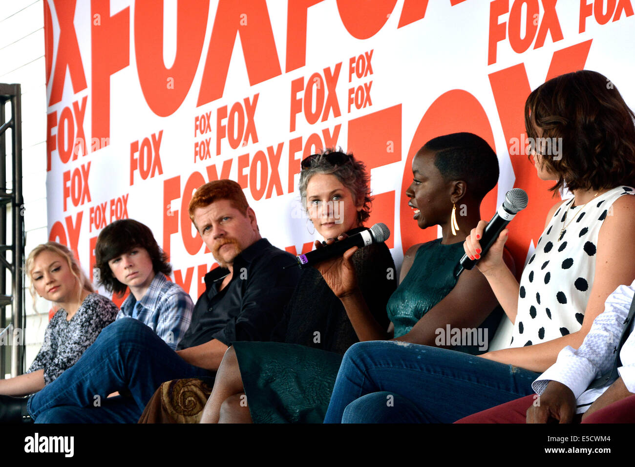 Emily Kinney, Chandler Riggs, Michael Cudlitz, Melissa McBride, Danai Gurira and Lauren Cohan attend the FOX Press Breakfast press conference of the series 'The Walking Dead' on July 25, 2014 at the roof lounge of the Andaz Hotel in San Diego during the San Diego Comic-Con International. Stock Photo