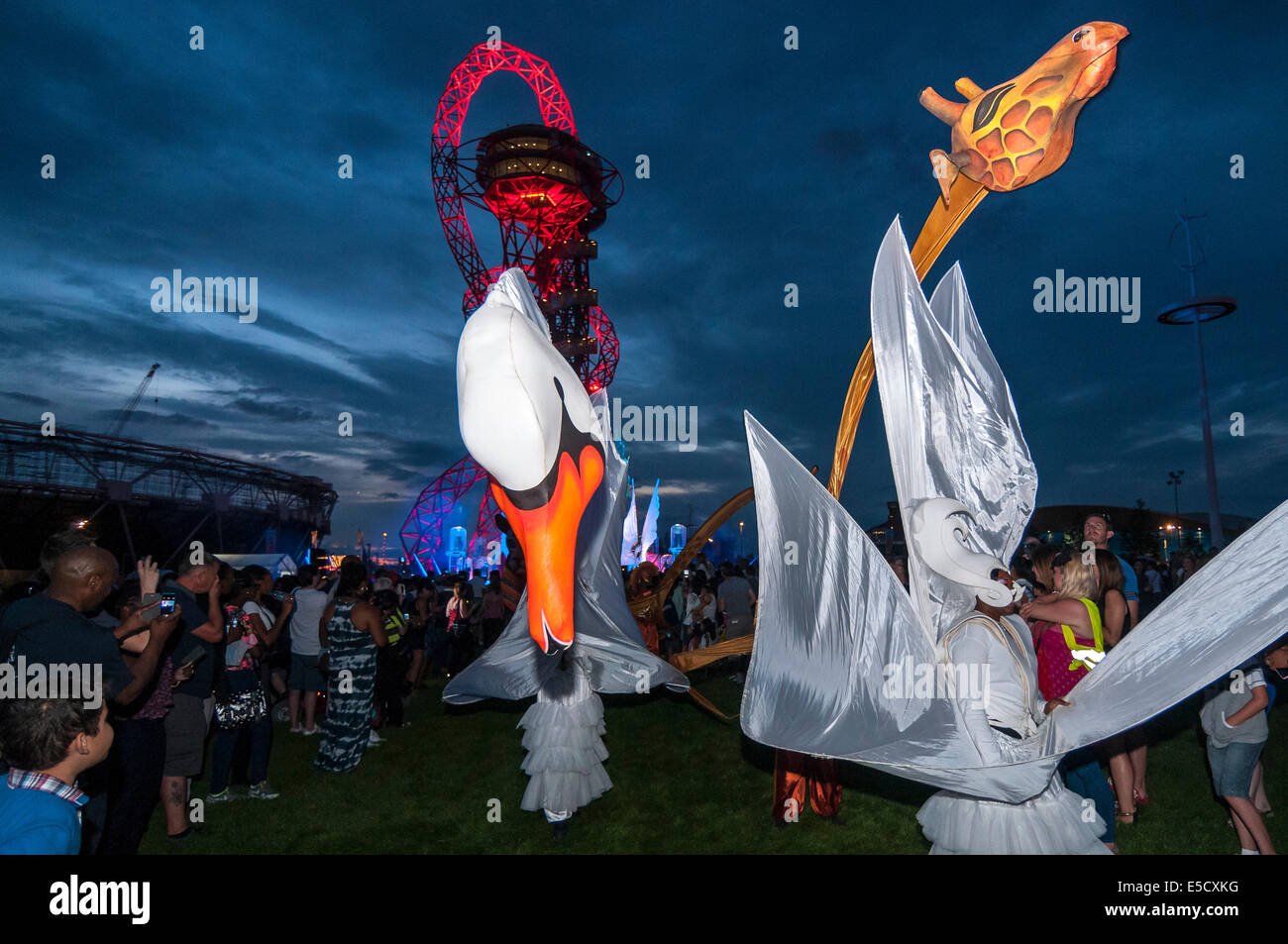 Stratford, London, UK, 27 July 2014.  The Great British Carnival celebrates the second anniversary of the Opening Ceremony of the London 2012 Olympic Games  as well as marking the midway point between the London and Rio Olympics.  The highlight was the Carnival of the Animals finale: featuring homegrown performers, local carnivals from Newham, Hackney, Tower Hamlets and Waltham Forest, musicians and carnivalesque creatures illuminated by pyrotechnic performers from Britain's oldest carnival in Bridgwater.  Credit:  Stephen Chung/Alamy Live News Stock Photo