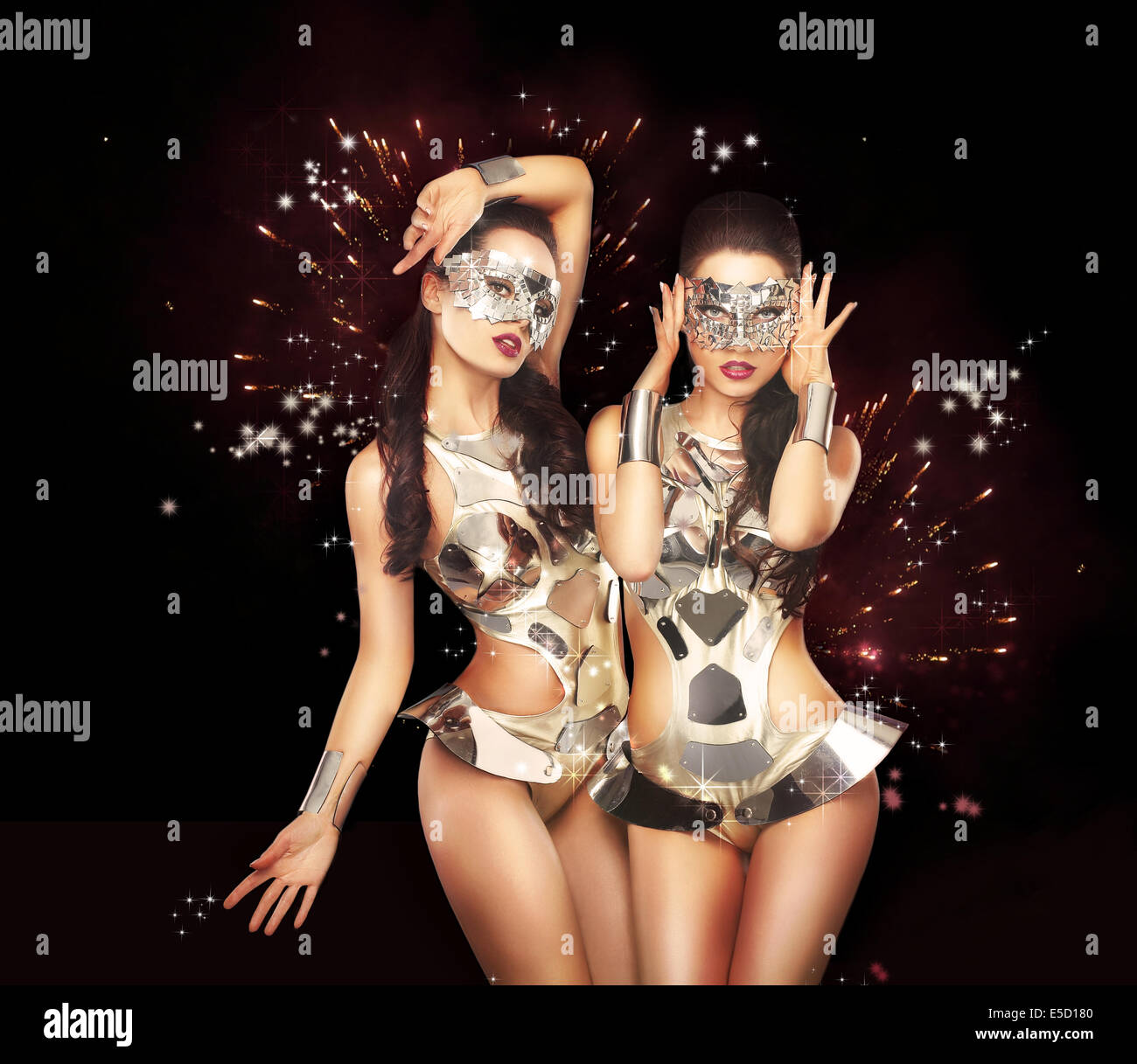Firework & Fancy Dress Party. Showgirls over Sparkling Background Stock Photo