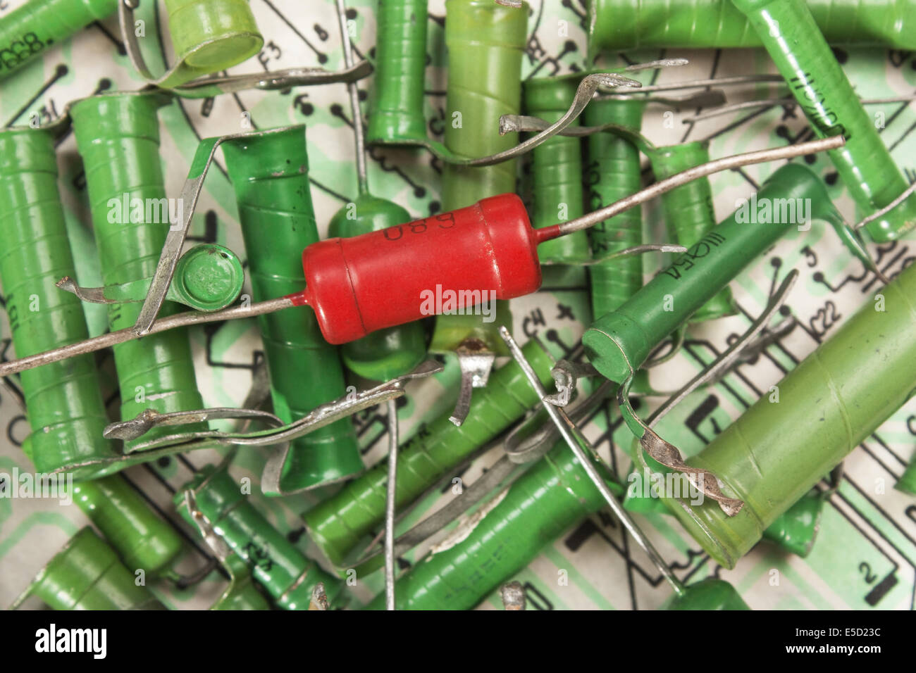 Old electronic components lie on the wiring diagram Stock Photo