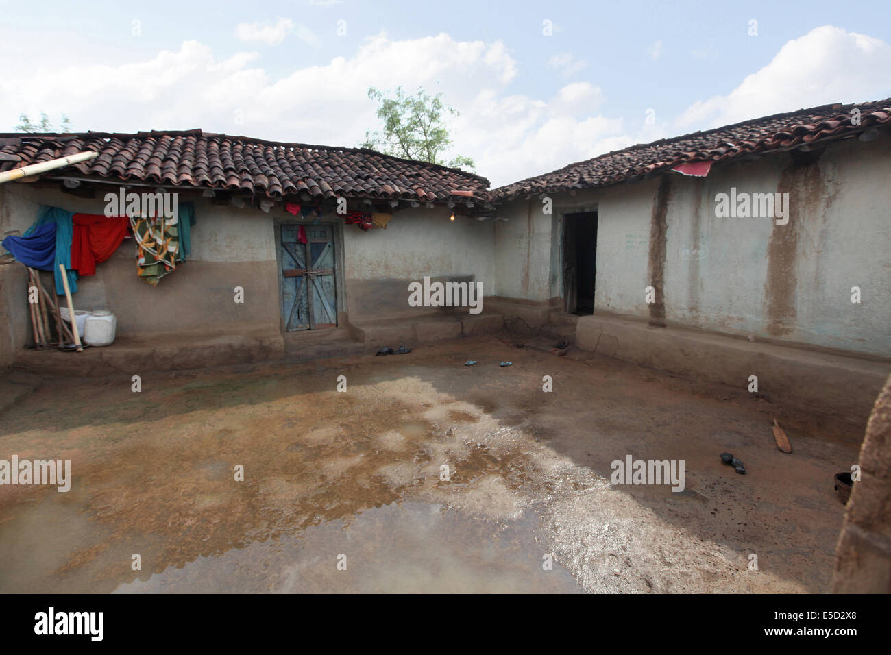 Tribal mud houses and courtyard. Baiga tribe. Chattisgadh, India Stock Photo