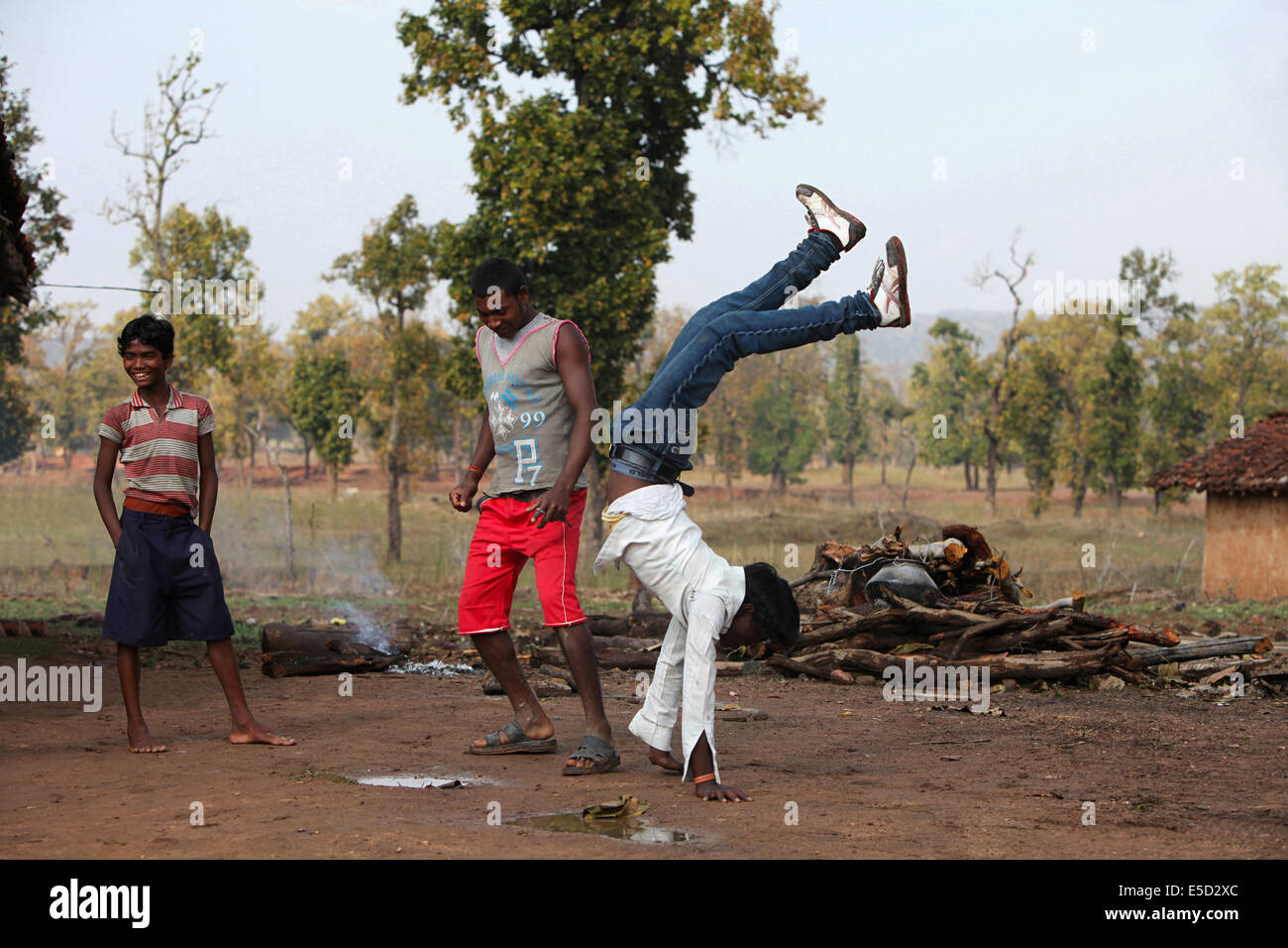 Teenagers performing acrobatics, Baiga tribe, Chattisgadh, India Stock Photo