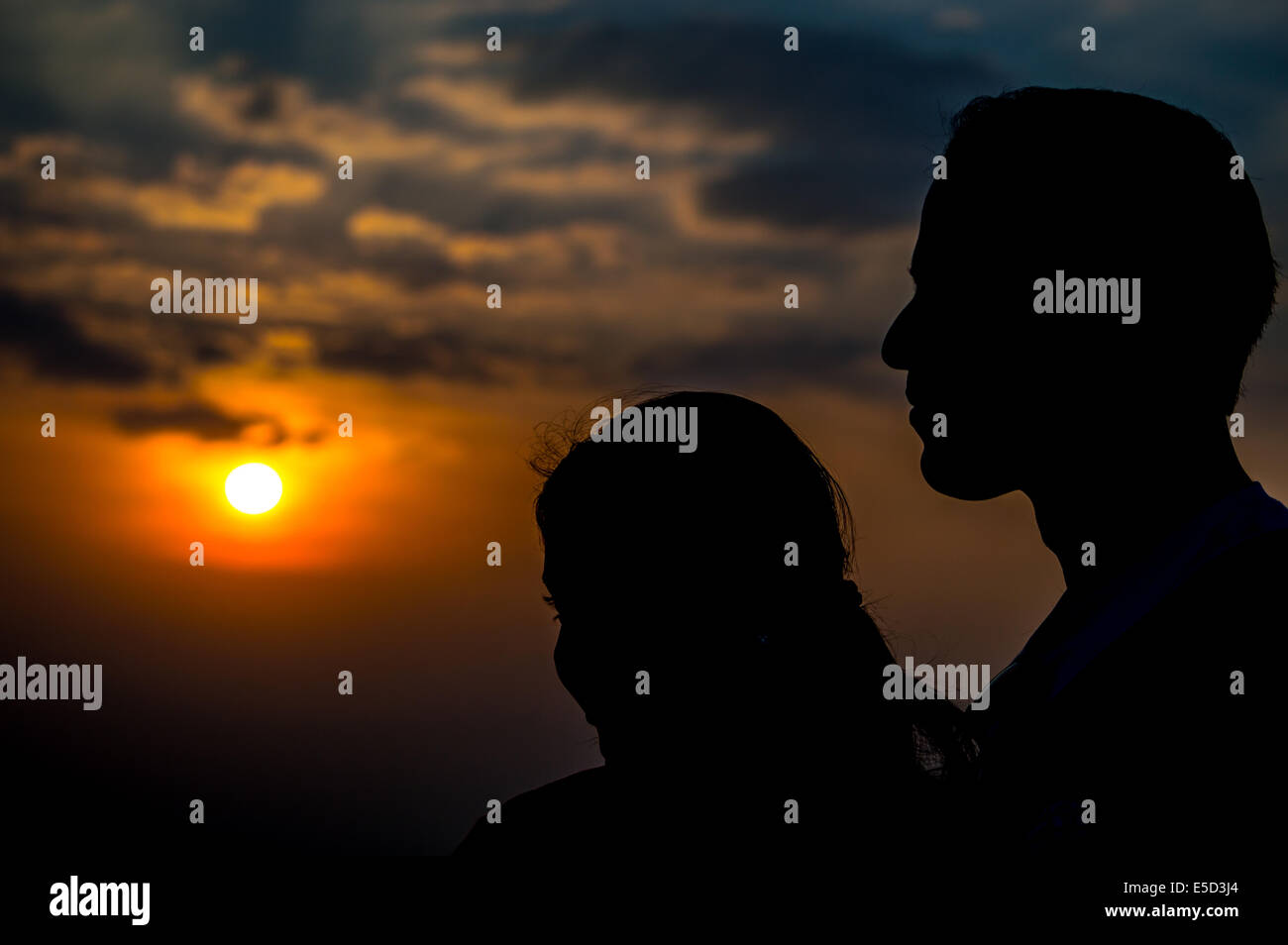 Couple love Sunset Stock Photo