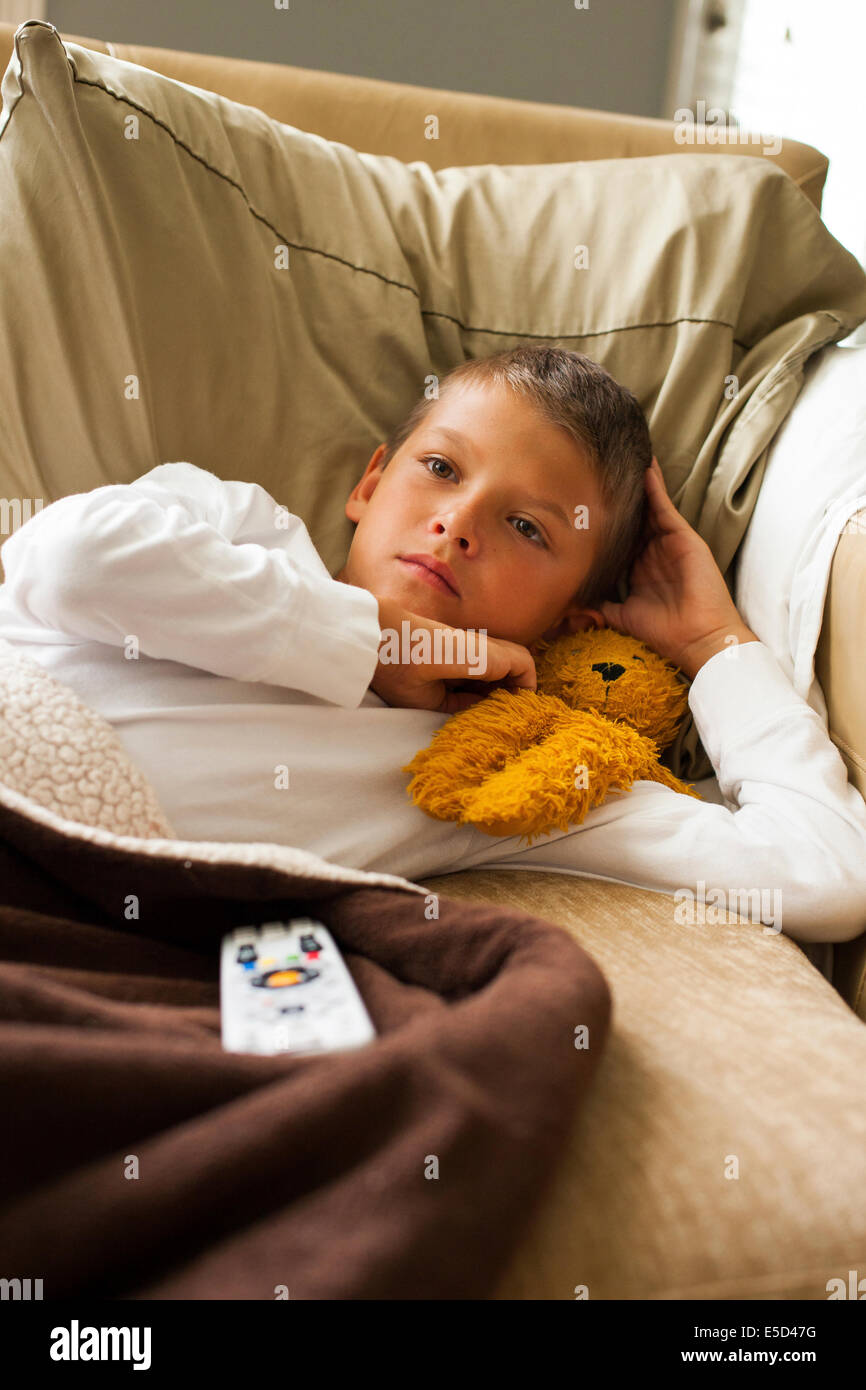 child feeling sick in bed Stock Photo Alamy
