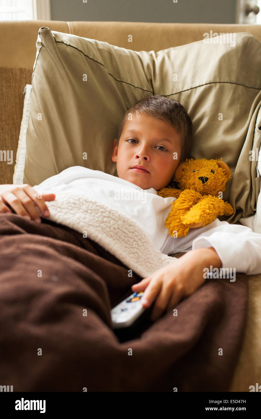 child feeling sick in bed Stock Photo - Alamy