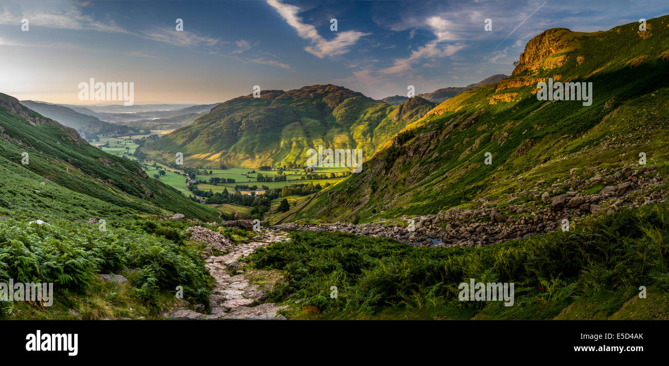 Early morning in the Langdales looking from the path up to Pavey Ark down into the valley Stock Photo