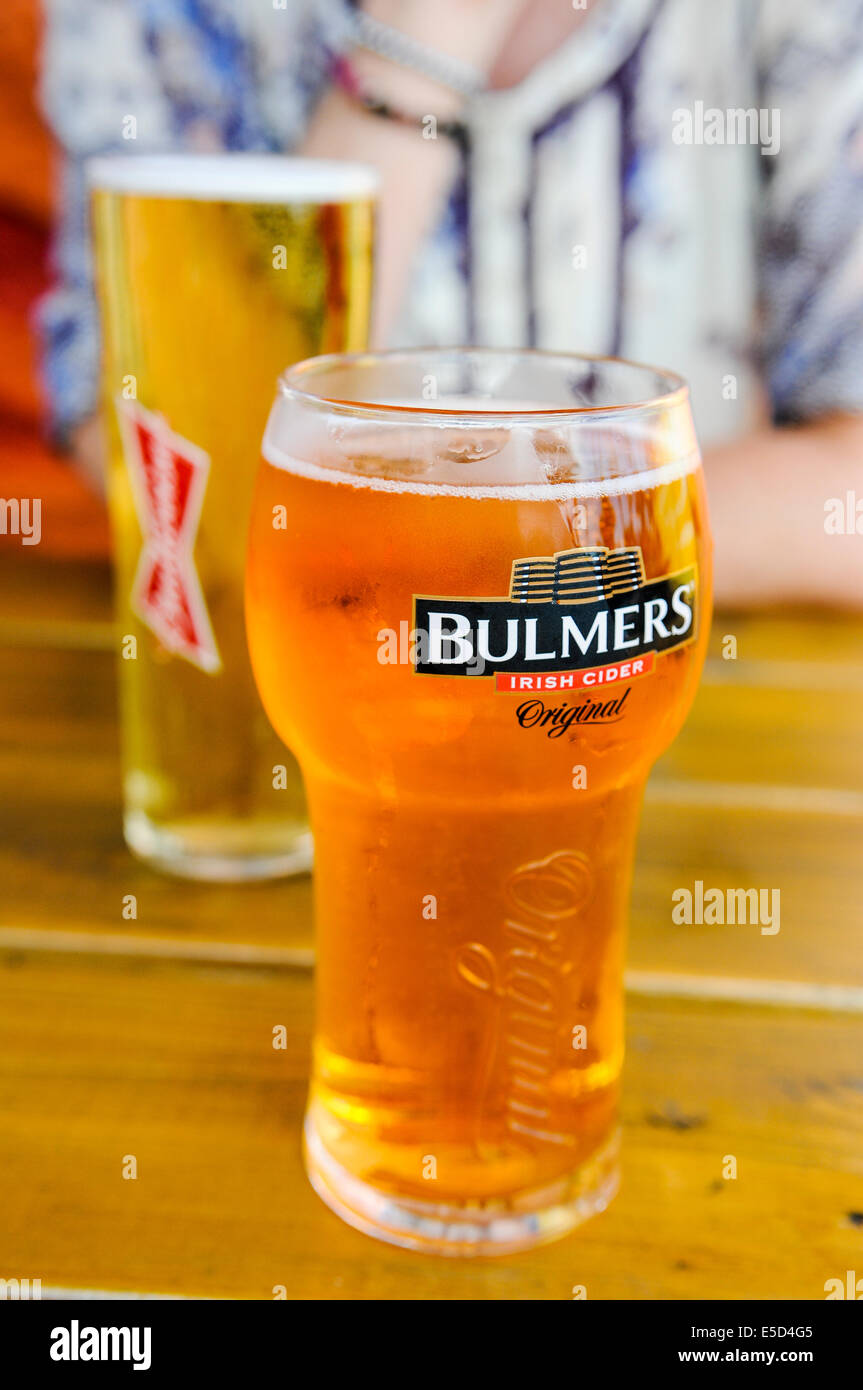 Pint of Bulmers cider and a Budweiser beer Stock Photo Alamy
