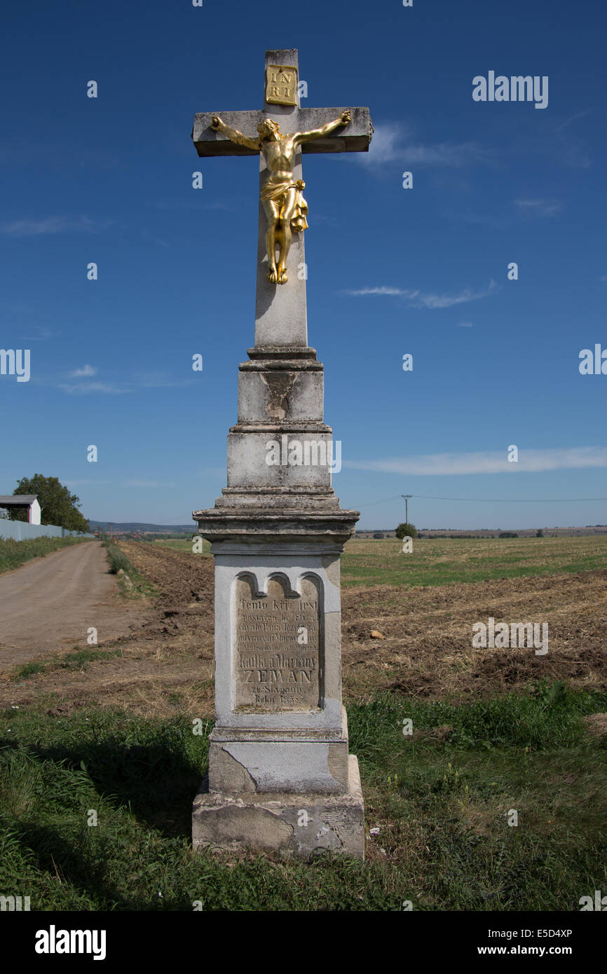 Road side cross site of an alleged mass grave from the Napoleonic  battlefield of Austerlitz, Czech republic Stock Photo