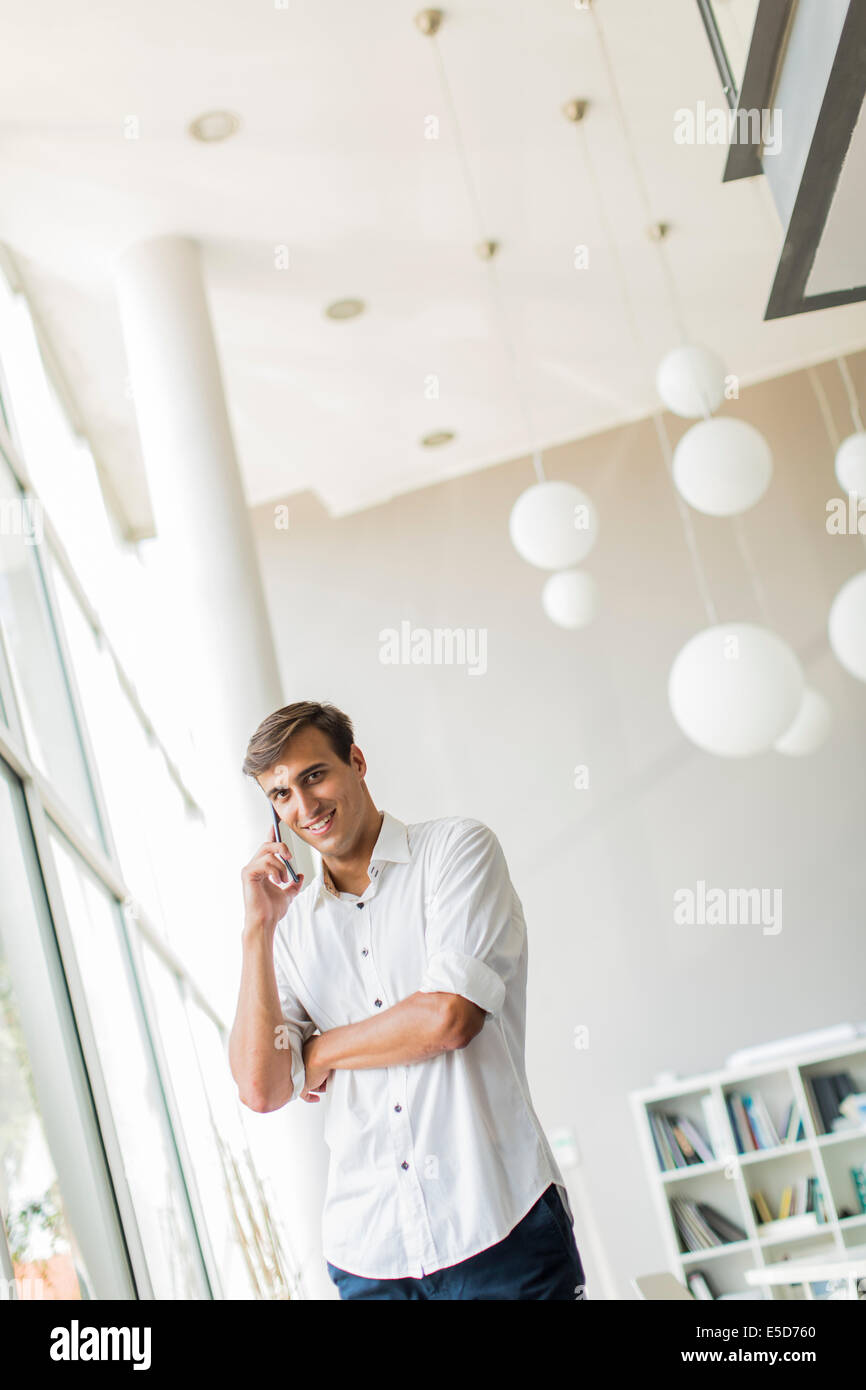 Young man in the office Stock Photo