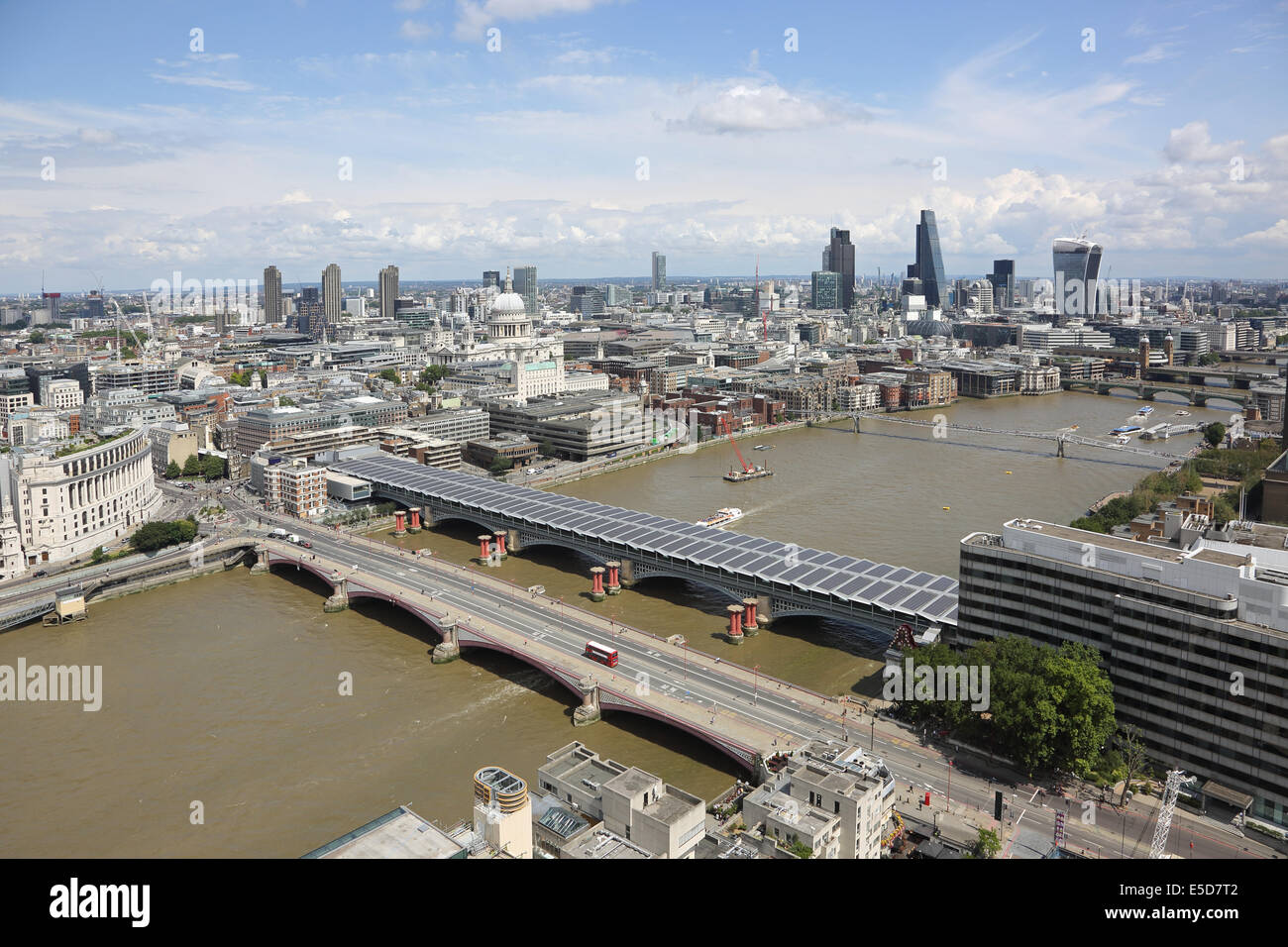 High level view of the River Thames at Blackfriars with the City of London in the background. St Pauls Cathedral in the centre Stock Photo