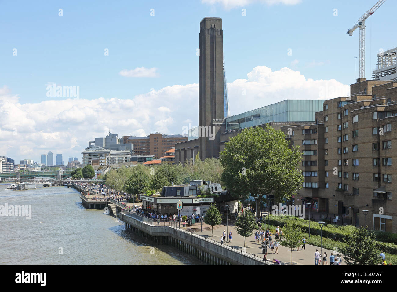 The Tate Modern art gallery in London viewed from Blackfriars Station showing the River Thames, the South Bank and Canary Wharf Stock Photo