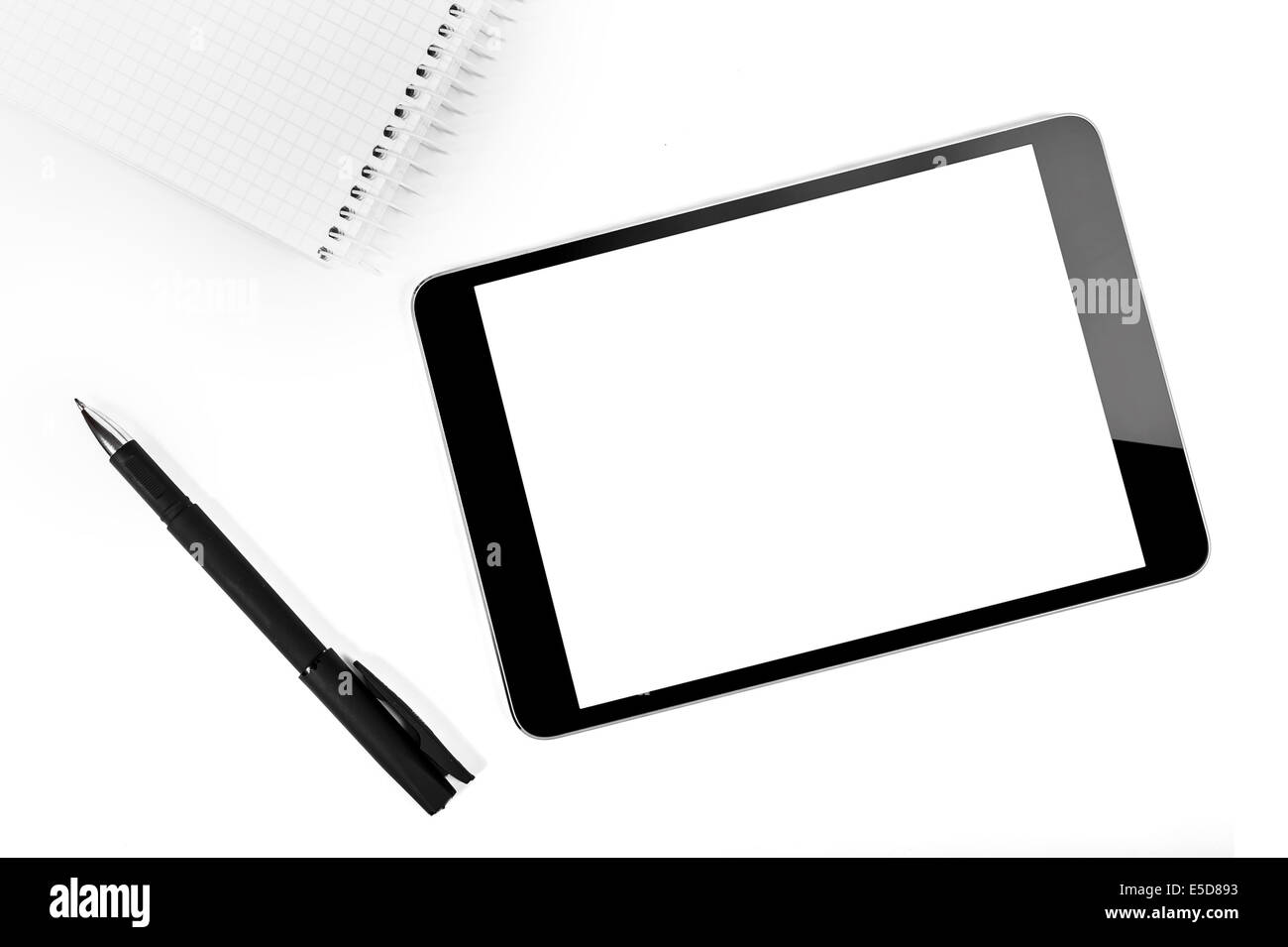Tablet pc with an empty screen close to a pen Stock Photo