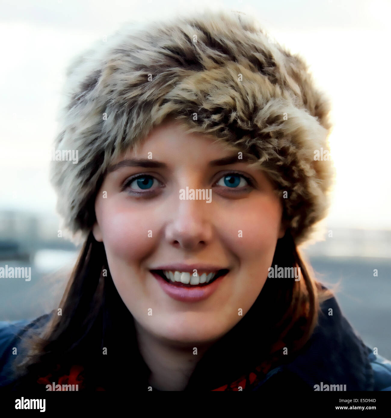 Young woman woolly hat smile hi-res stock photography and images - Alamy