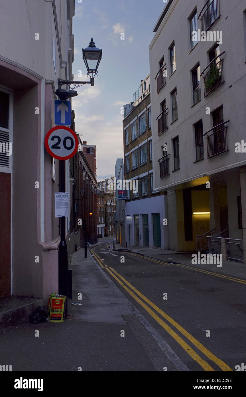 Narrow one way street with double yellow lines and 20mph speed limit, London Stock Photo