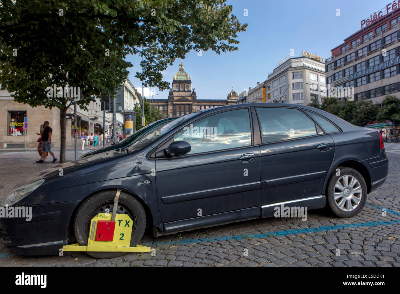 Wheelclamp, punishment for bad car parking, Wenceslas Square, Prague Czech Republic car clamped illegal Stock Photo