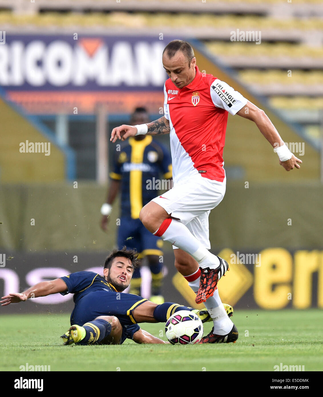Parma, Italy. 28th July, 2014. Dimitar Berbatov (R) of AS Monaco vies with Cristobal Jorquera of FC Parma during a friendly match between AS Monaco and FC Parma in Parma, Italy, July 28, 2014. AS Monaco won 2-0. © Alberto Lingria/Xinhua/Alamy Live News Stock Photo