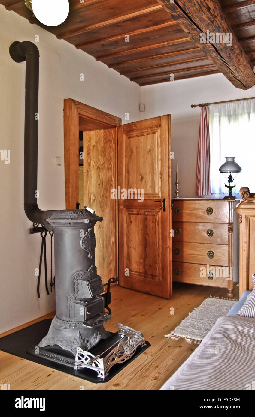 Room with stove and antique furniture Stock Photo - Alamy - Established Hexagonal Room Stove Furniture