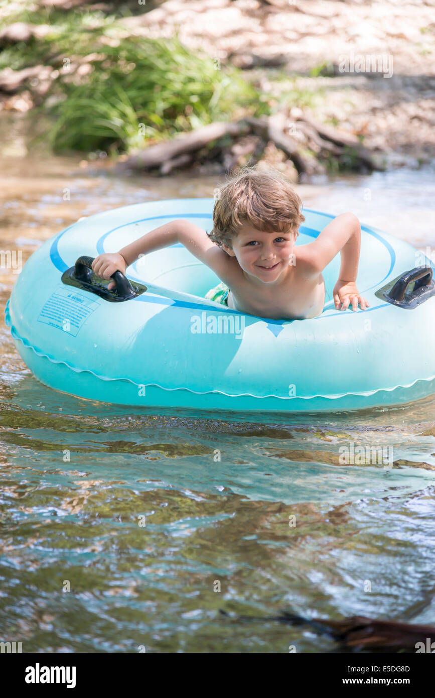 USA, Texas, Boy tubing the Frio River Stock Photo Alamy