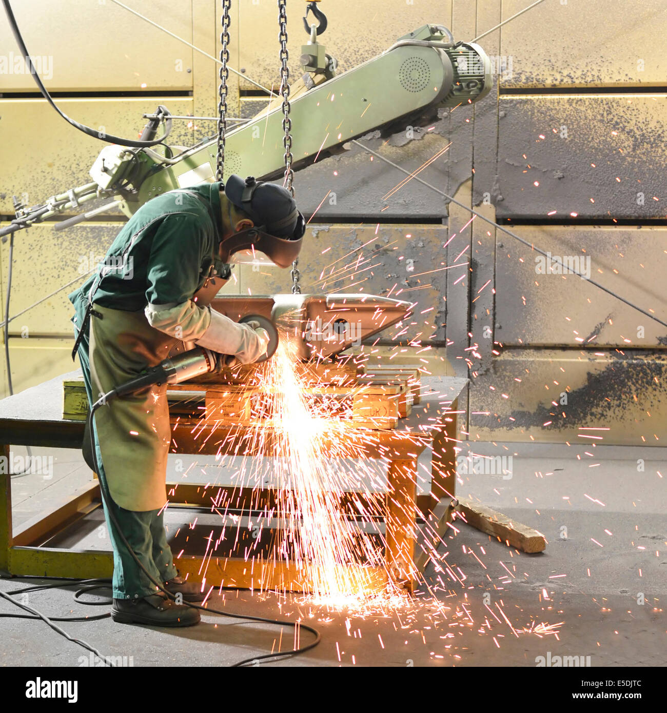 Working with grinding machine in a foundry Stock Photo Alamy