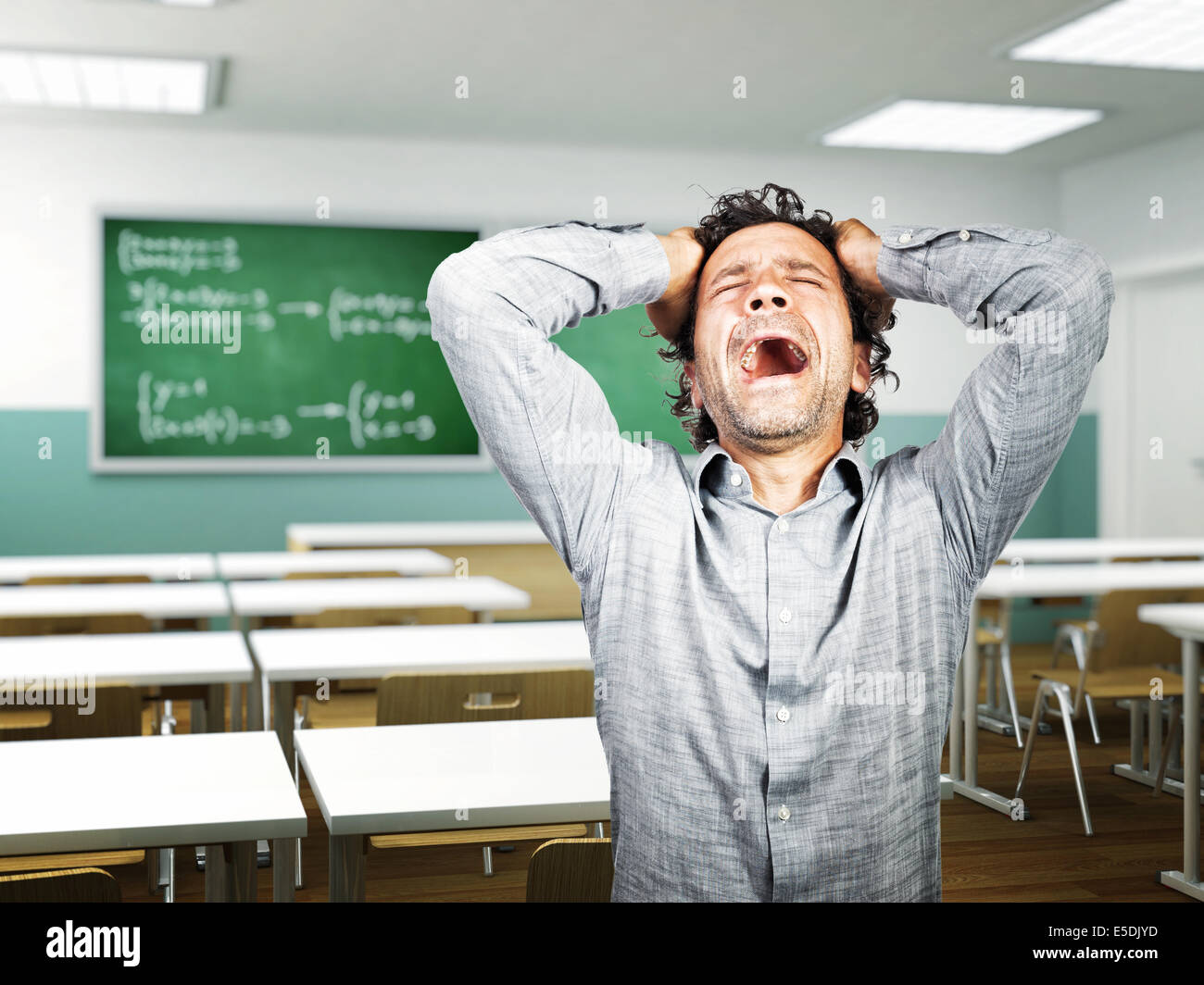 portrait of stressed teacher at school Stock Photo - Alamy