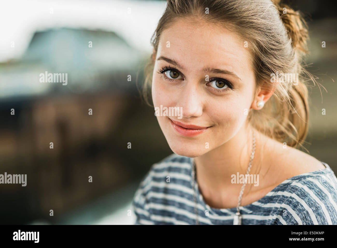 Portrait of smiling teenage girl Stock Photo - Alamy
