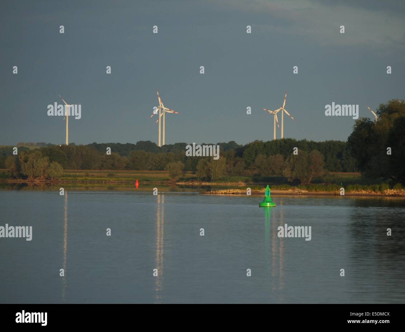 wind turbine on blue sky background Stock Photo - Alamy