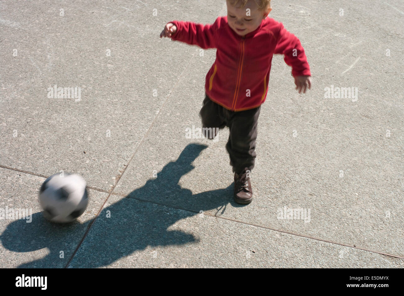 Baby boy playing soccer Stock Photo