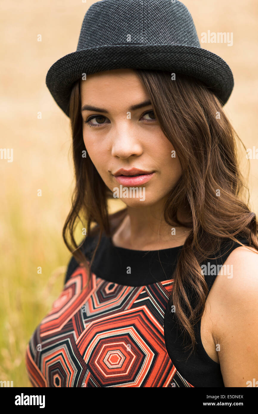 Person wearing black hat hi-res stock photography and images - Alamy