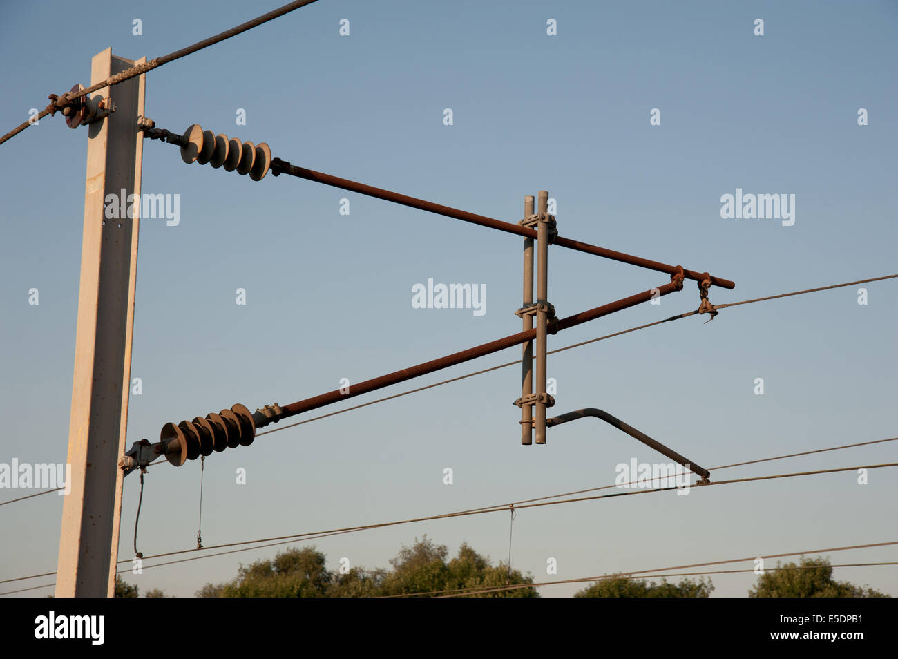 The support for overhead wires on the West Coast Mainline Stock Photo