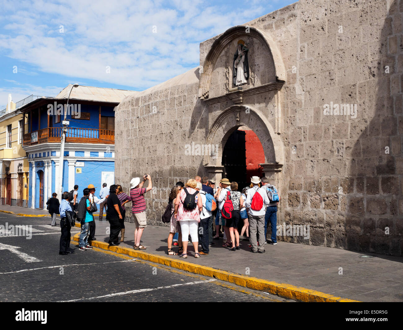 tourists at the Monastery of Saint Catherine's entrance - Arequipa, Peru Stock Photo