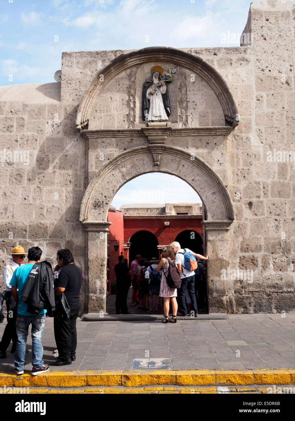 tourists at the Monastery of Saint Catherine's entrance - Arequipa, Peru Stock Photo