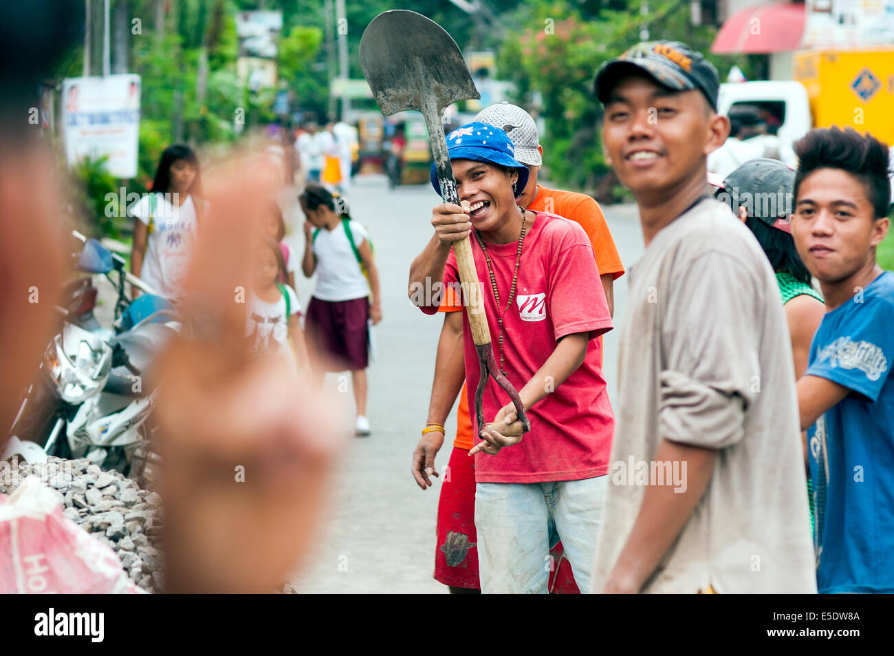 Road workers, CBD, Ozamis City, Misamis Occidental, Mindanao, Philippines Stock Photo