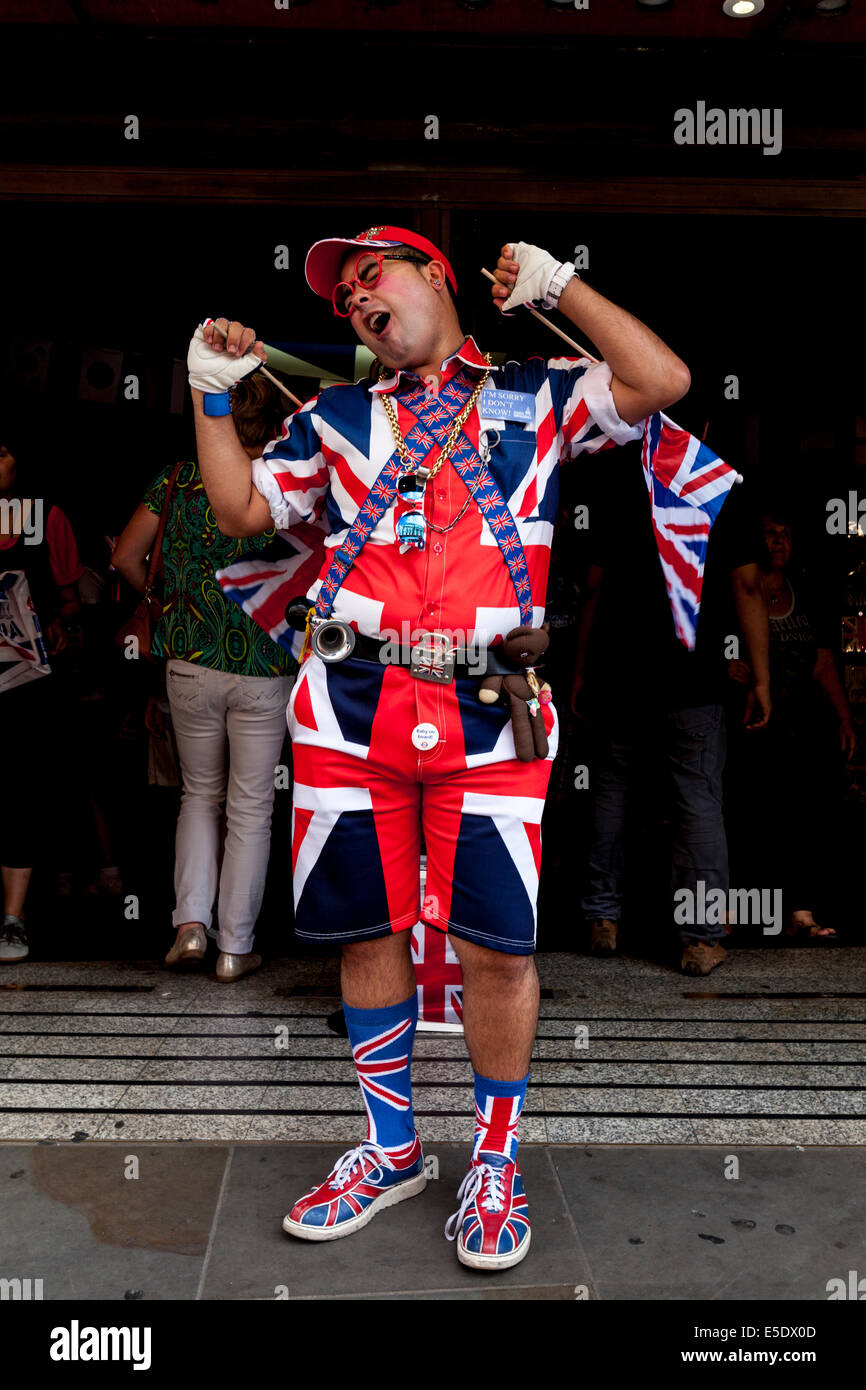 A Man In A Union Jack Costume Stands Outside The Cool Britannia ...