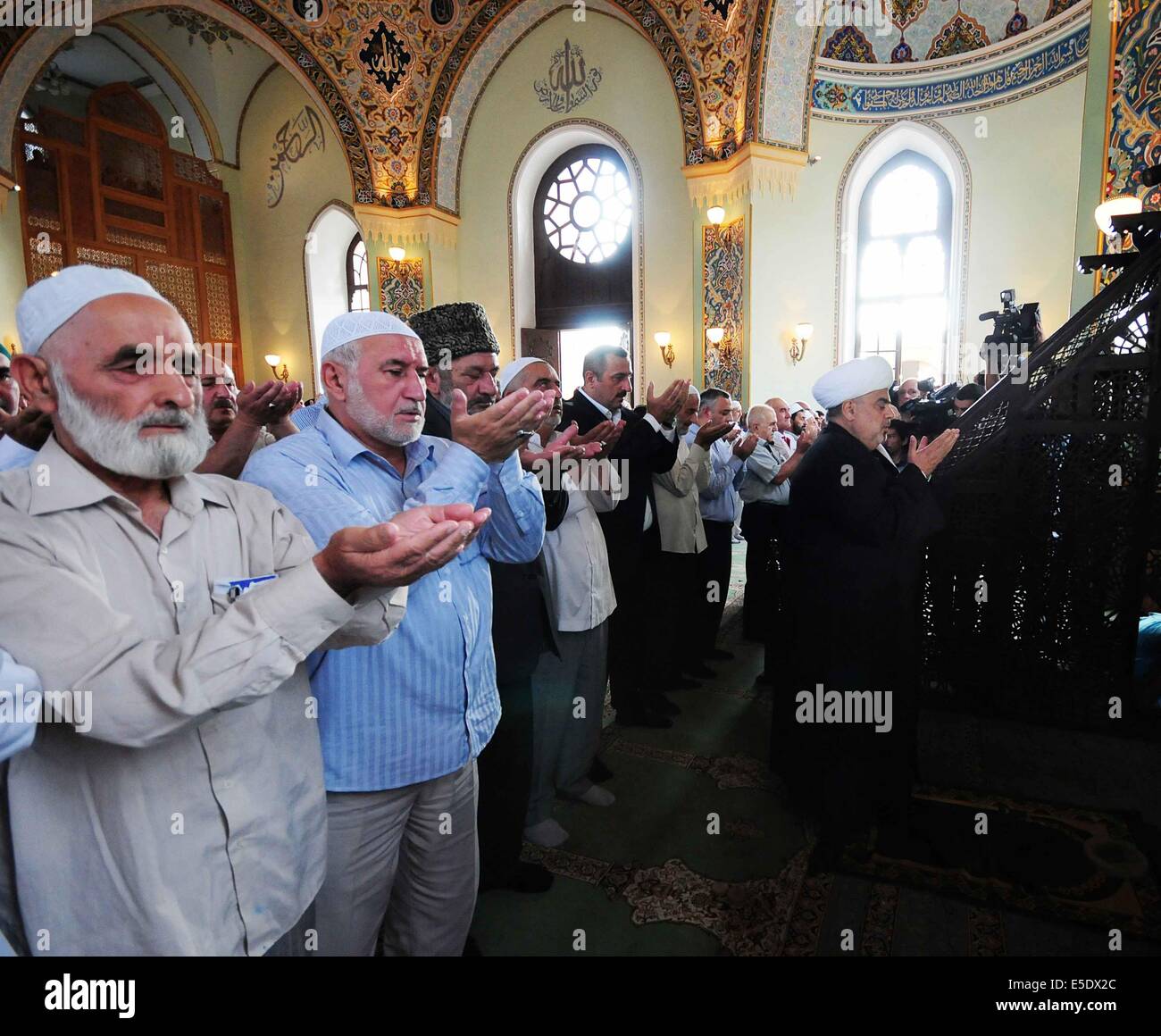 Baku, Azerbaijan. 29th July, 2014. Azerbaijani Muslims offer prayers to
