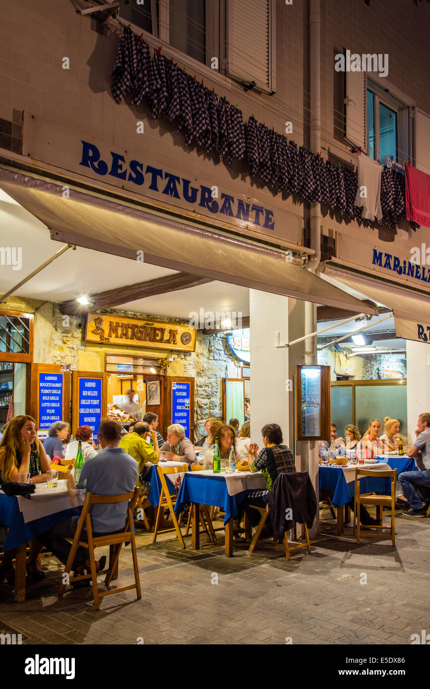 Outdoor restaurant at waterfront, Donostia San Sebastian, Gipuzkoa, Basque Country, Spain Stock Photo