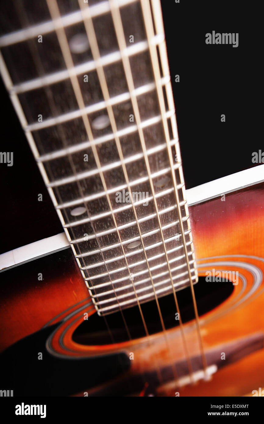 Finger-board of acoustical guitar. Shallow DOF! Stock Photo