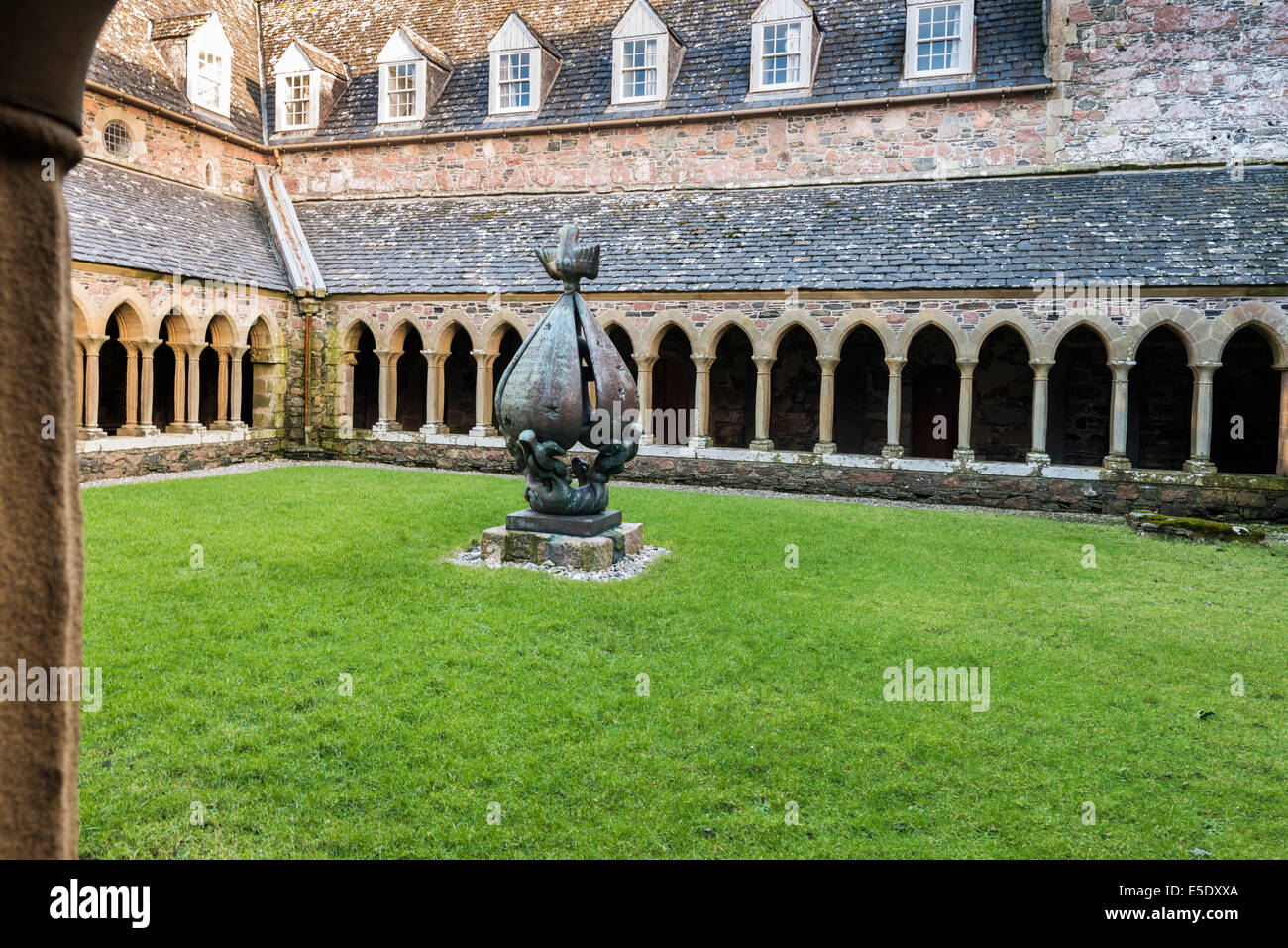 The cloisters of Iona Abbey. At the centre of the cloister garth is a ...