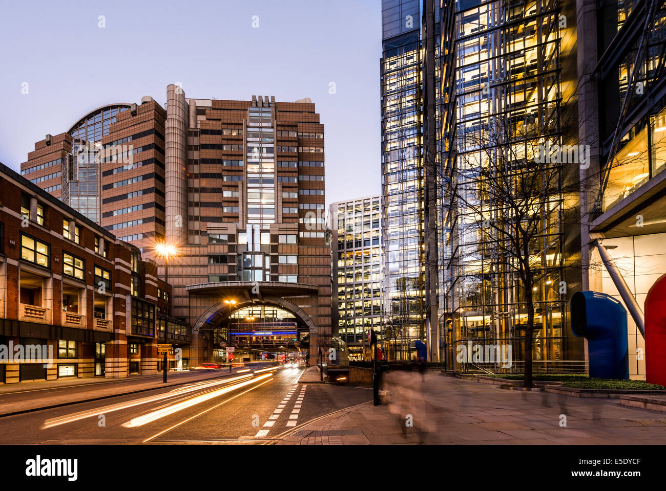 London Wall at sunset as traffic streaks along the road. Crossing the