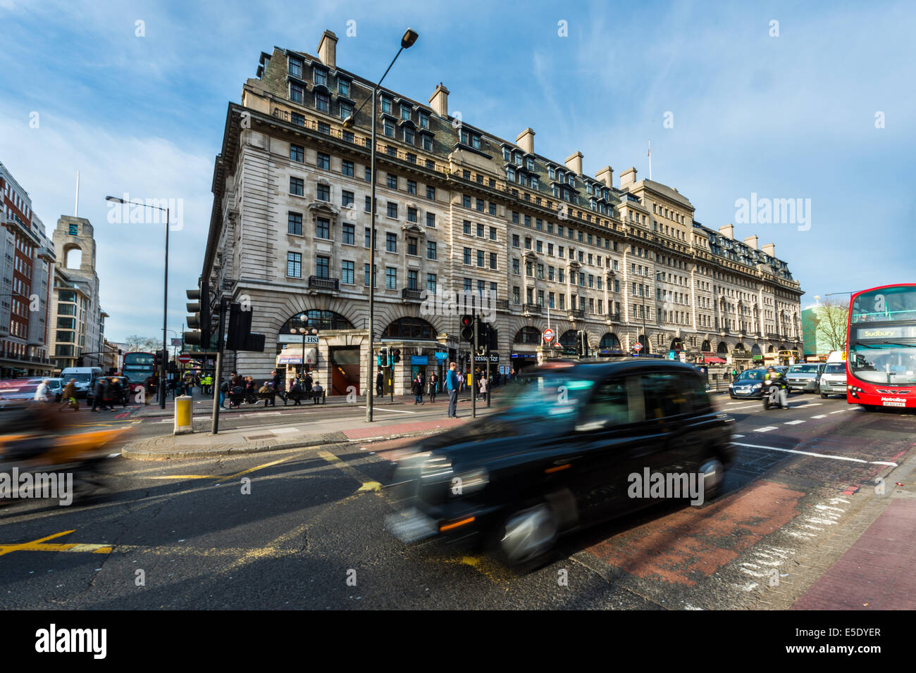 A London black cab taxi passes by Baker Street tube station on the  Marylebone Road Stock Photo - Alamy