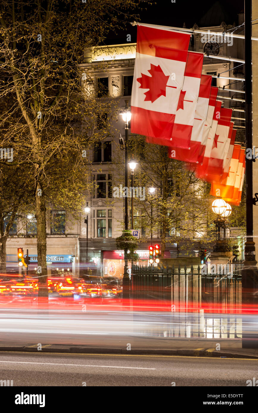 Canadian flags flying outside Canada House, a Greek Revival building on