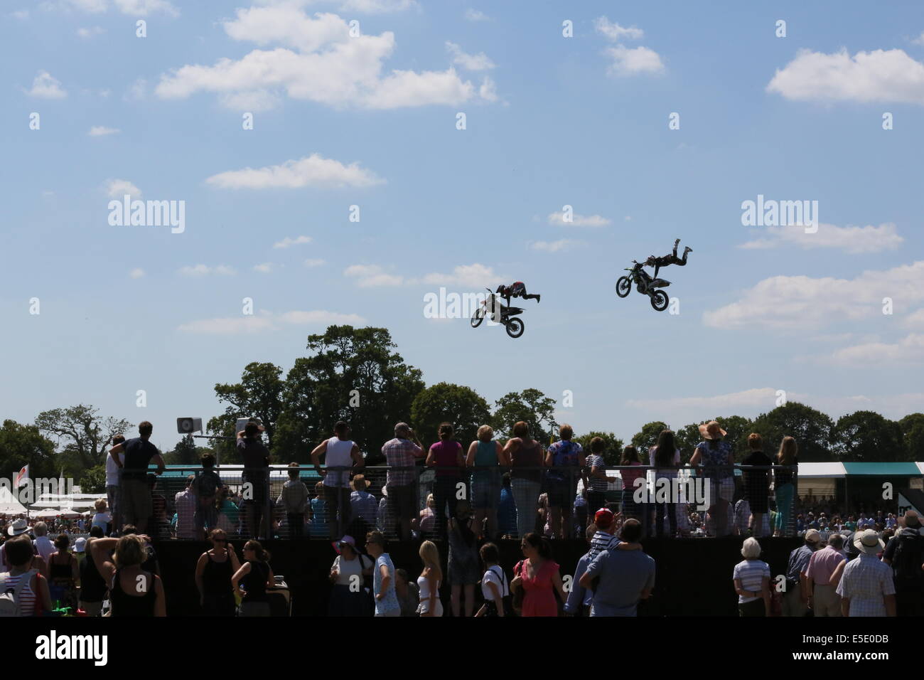 Stunt motorcyclists astonish the crowds on day one of the New Forest Show, Hampshire, UK. Stock Photo