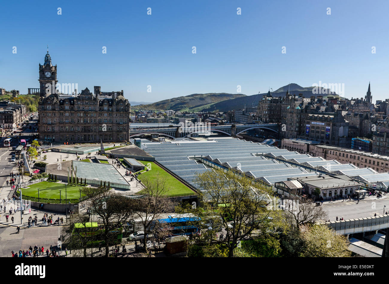 Looking East across Edinburgh to the Balmoral Hotel, Waverley Railway Station, North Bridge, Old Town and Arthur's Seat. Stock Photo