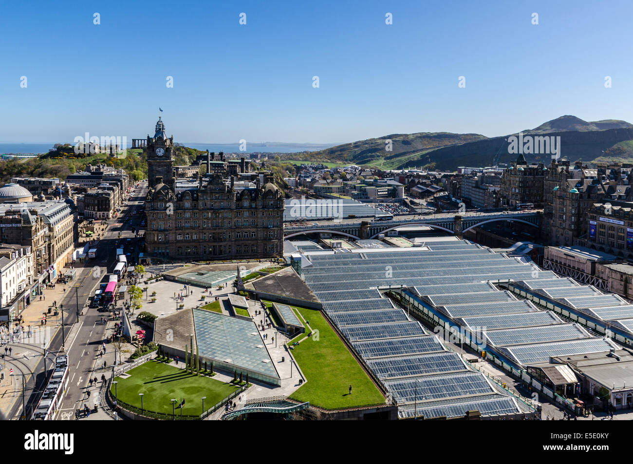 Looking East across Edinburgh to the Balmoral Hotel, Waverley Railway Station, North Bridge, Old Town and Arthur's Seat. Stock Photo
